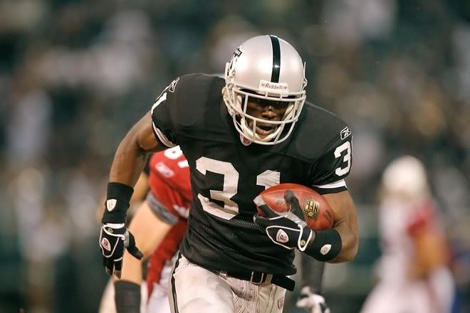 Hiram Eugene #31 of the Oakland Raiders returns an interception for a 36-yard touchdown against the Arizona Cardinals on August 11, 2007 at McAfee Stadium Pictures, Images and Photos