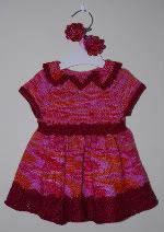 "Love is...."  a beautiful knitted Ridinghood Dress in reds(9 months)