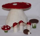 Custom Toadstool house with 3 mushroom people, 2 mushrooms and 1 hedgehog